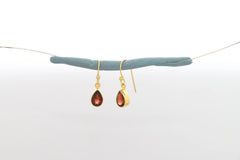 red garnet cut earrings