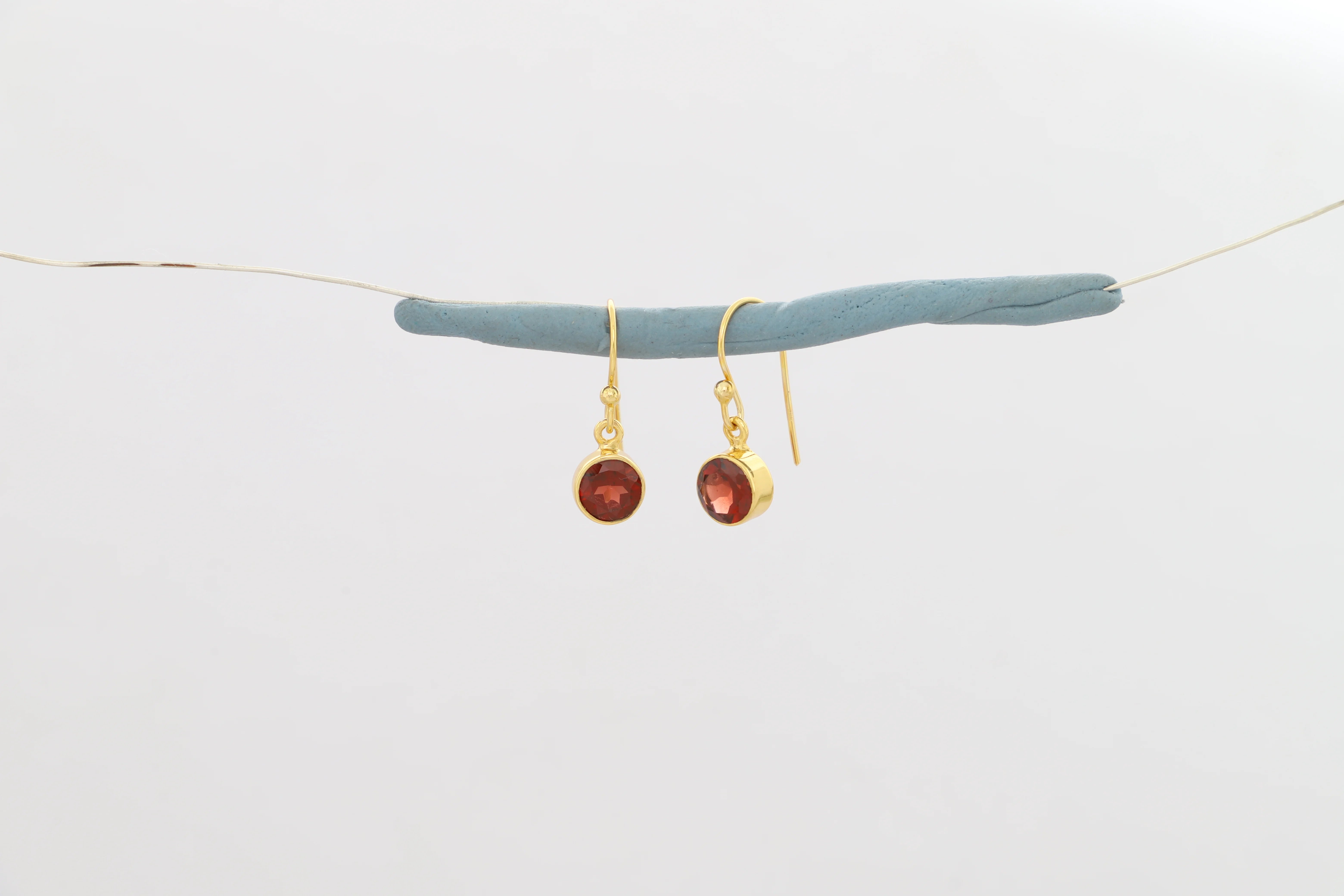 red garnet cut earrings