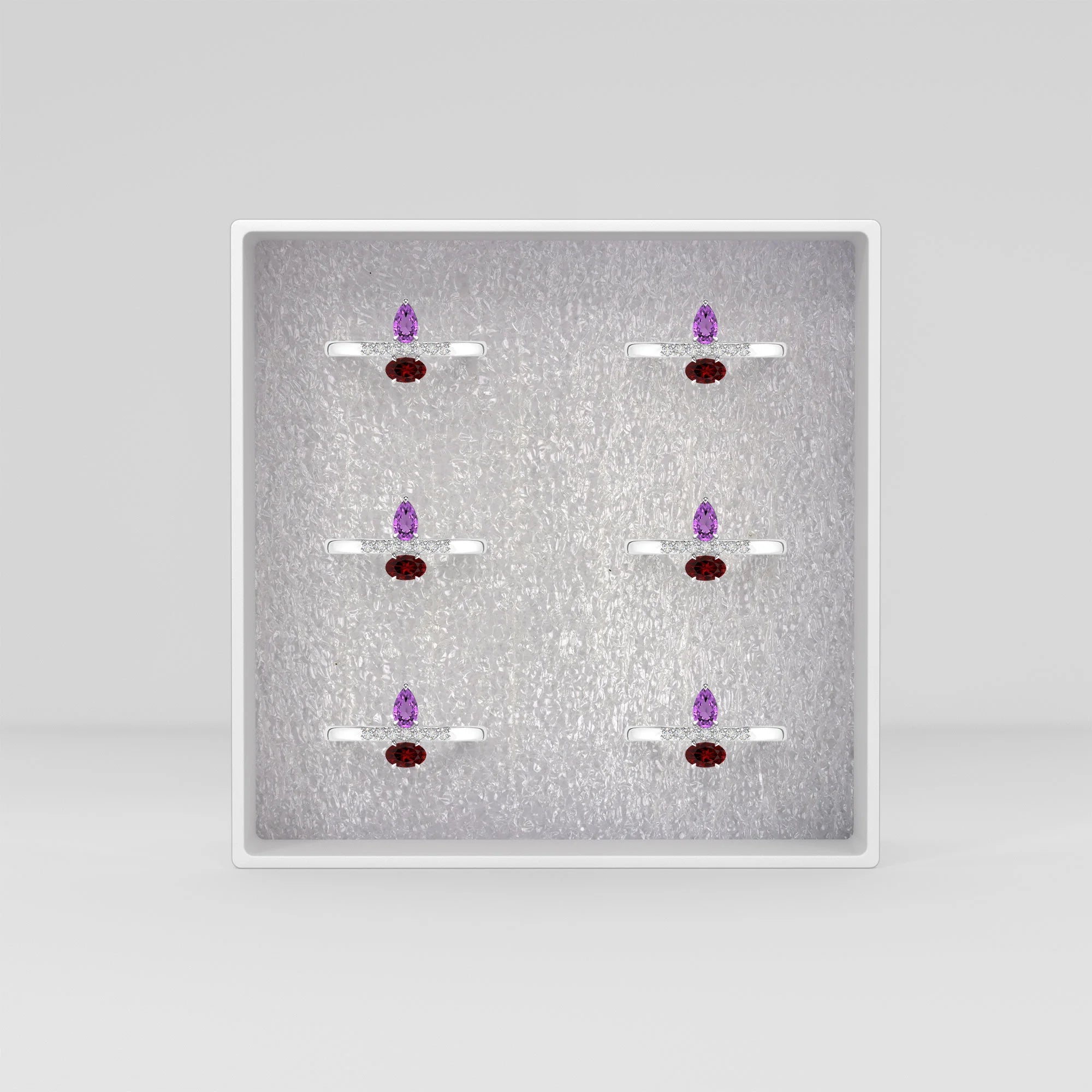 amethyst-red-garnet prong-set ring