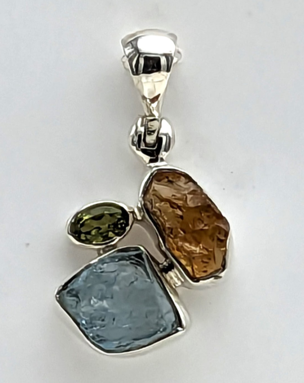 Designer Aquamarine Pendant Studded With Citrine & Peridot