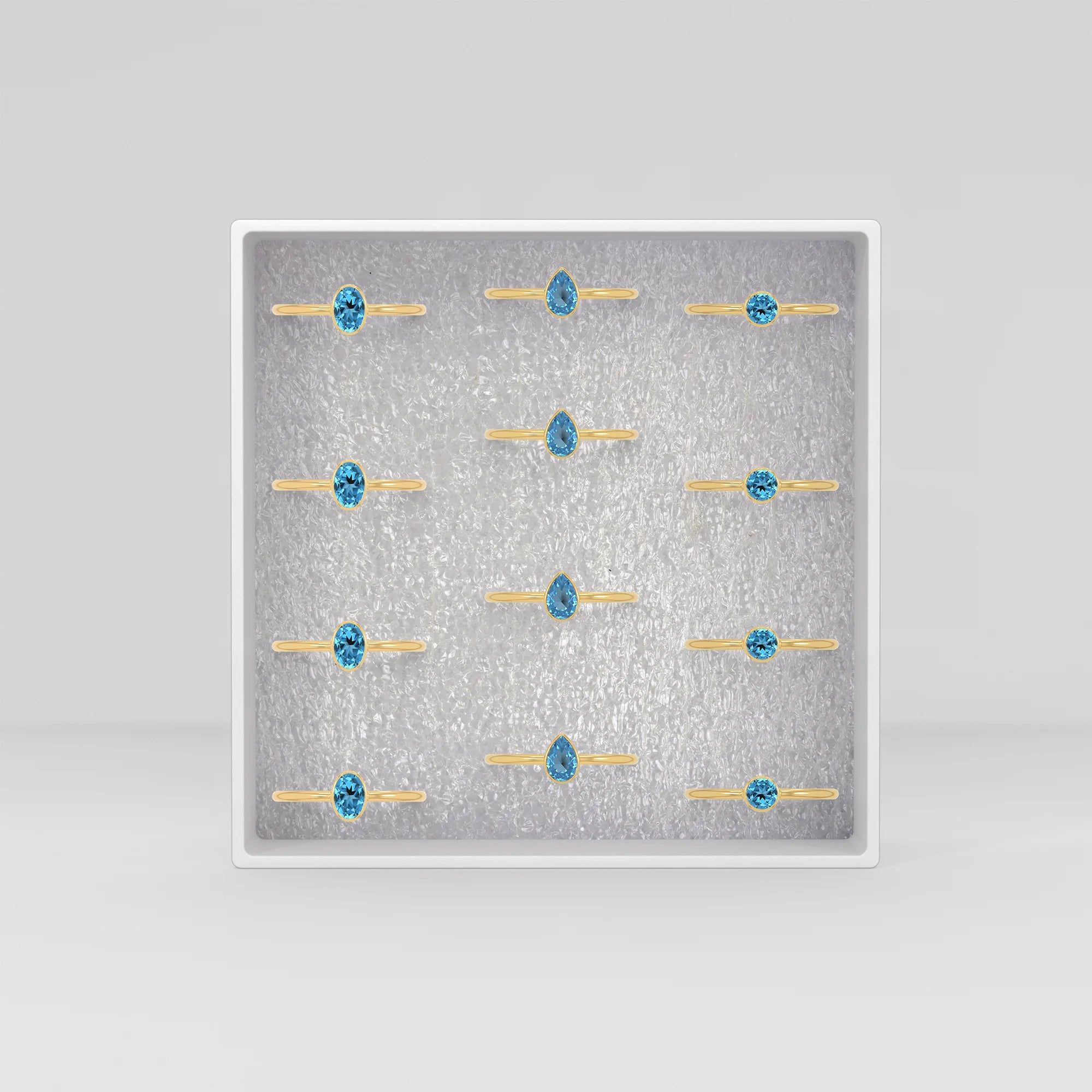 swiss blue topaz stackable bezel-set ring