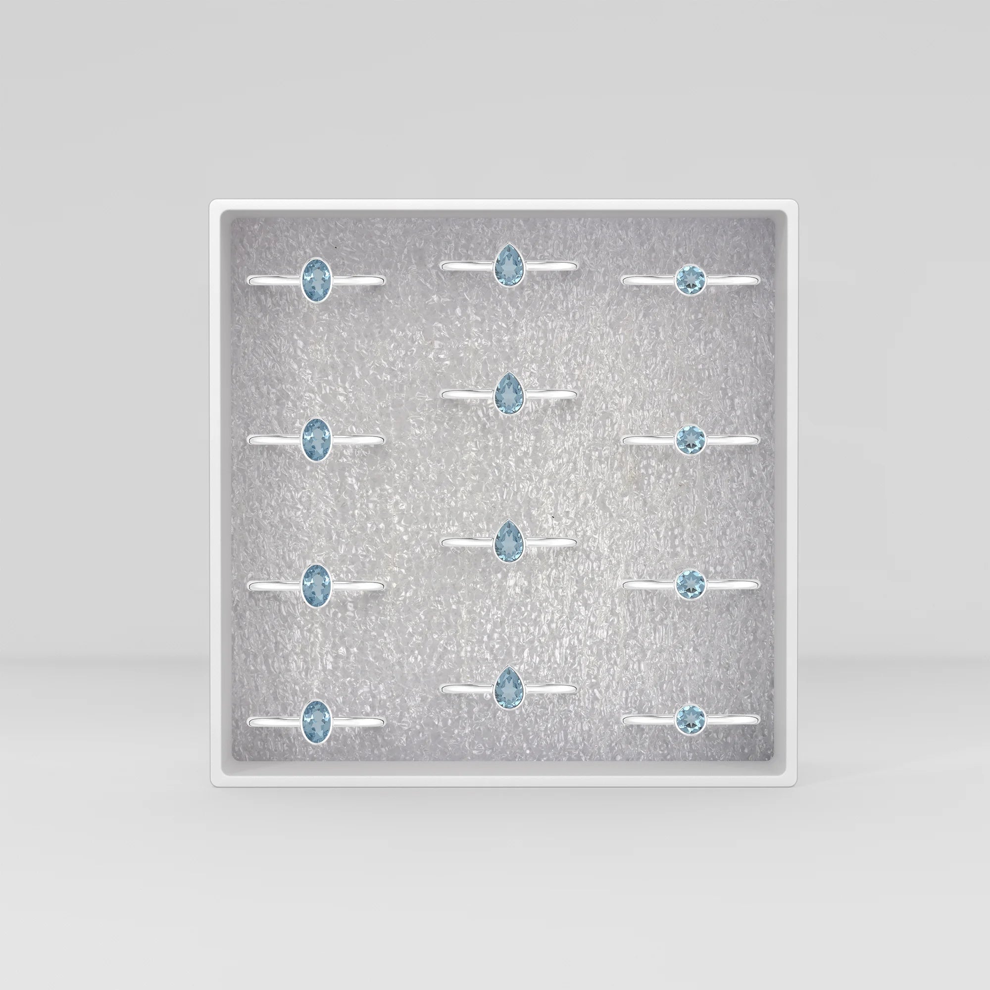 sky blue topaz stackable bezel-set ring