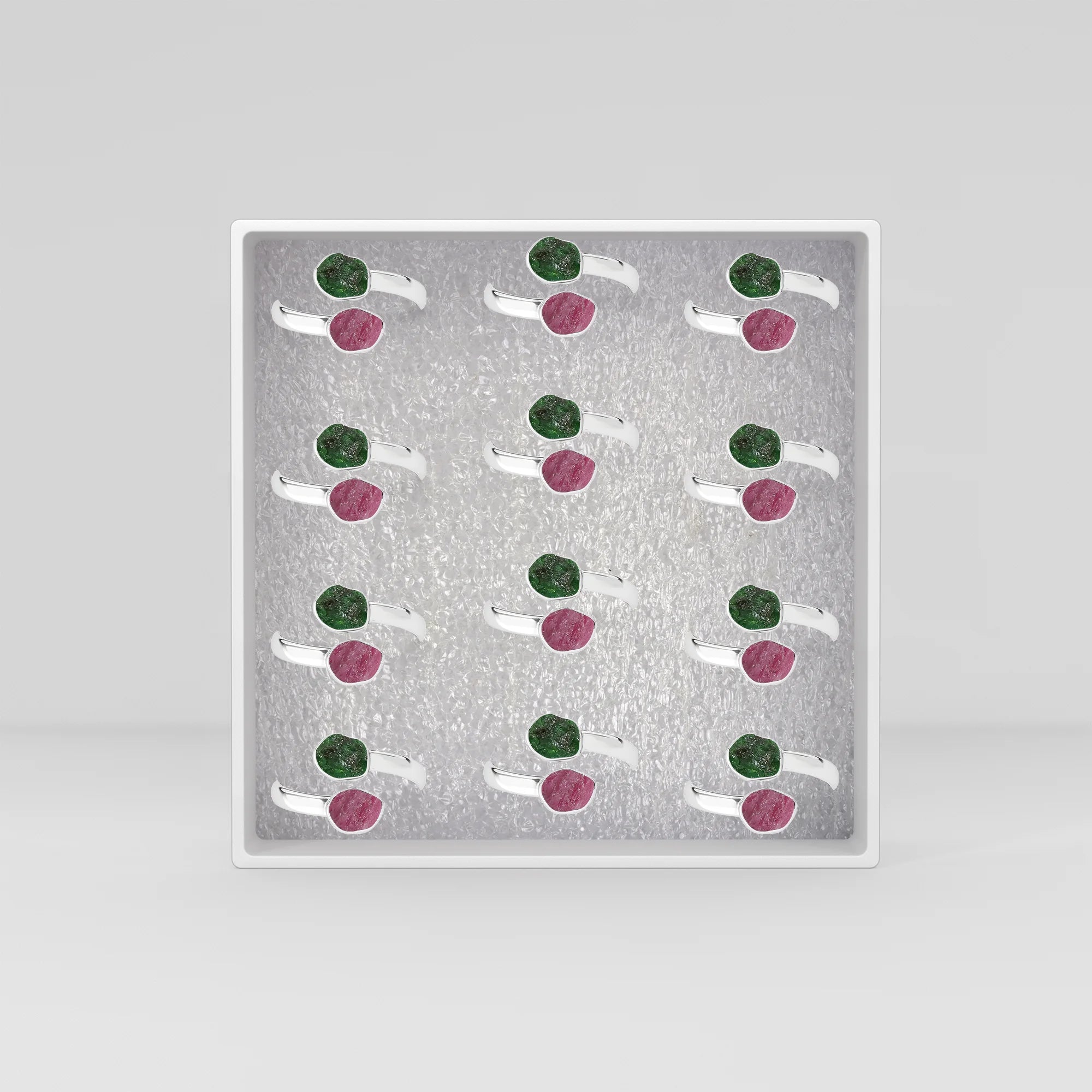 emerald-ruby bezel-set ring