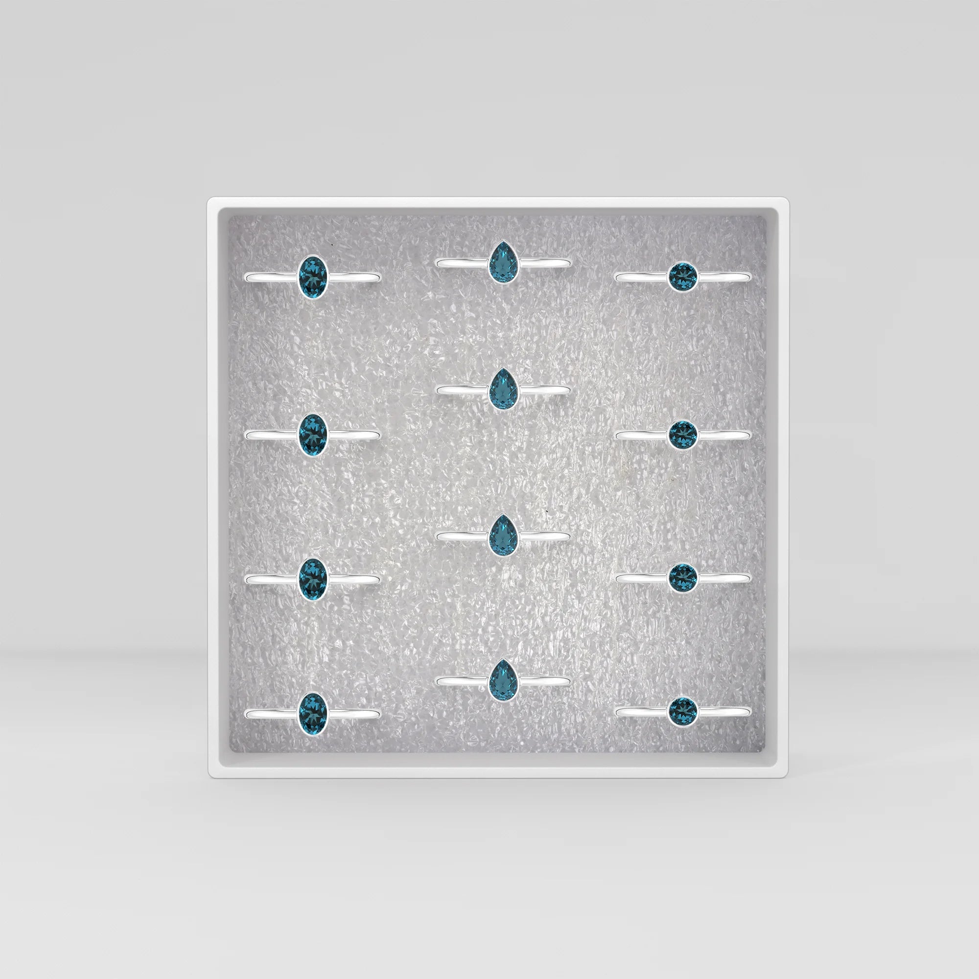 london-blue-topaz stackable bezel-set ring