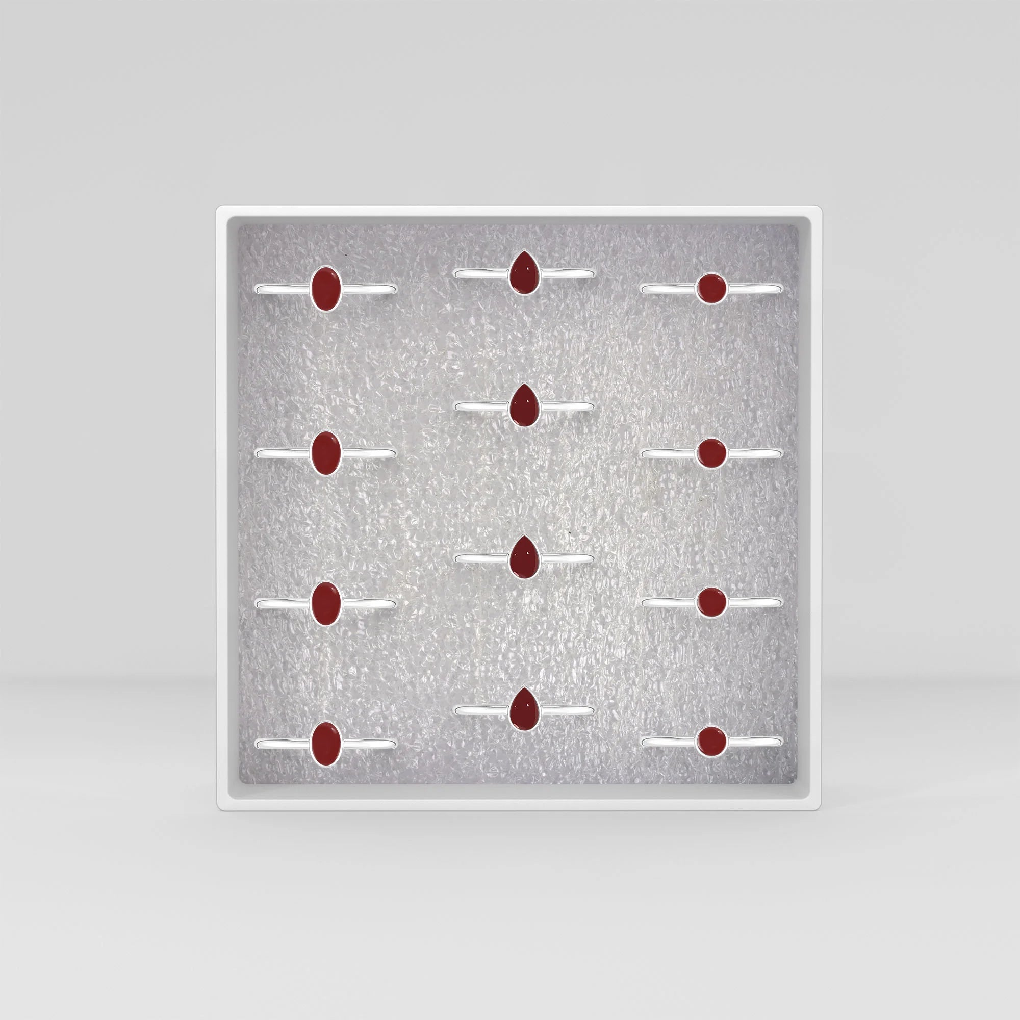 red garnet bezel-set ring