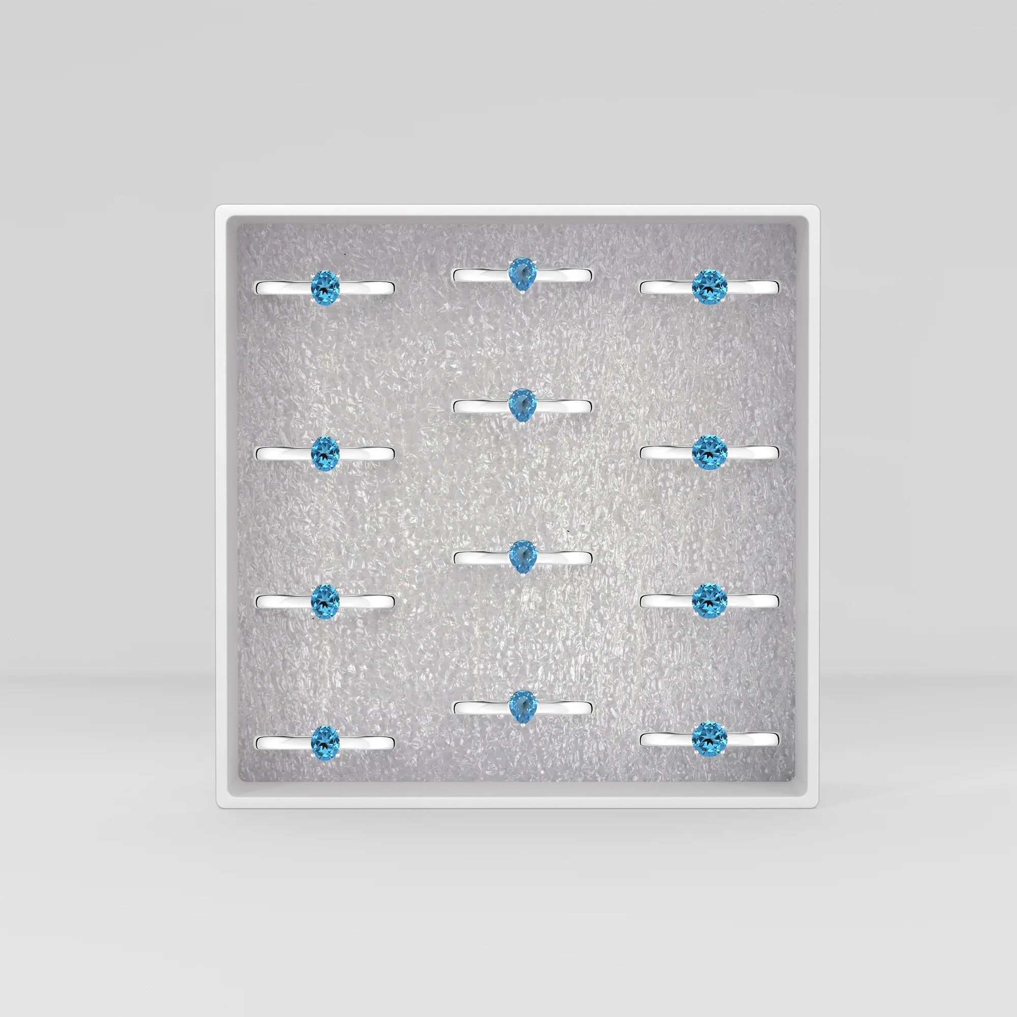 swiss blue topaz stackable prong-set ring