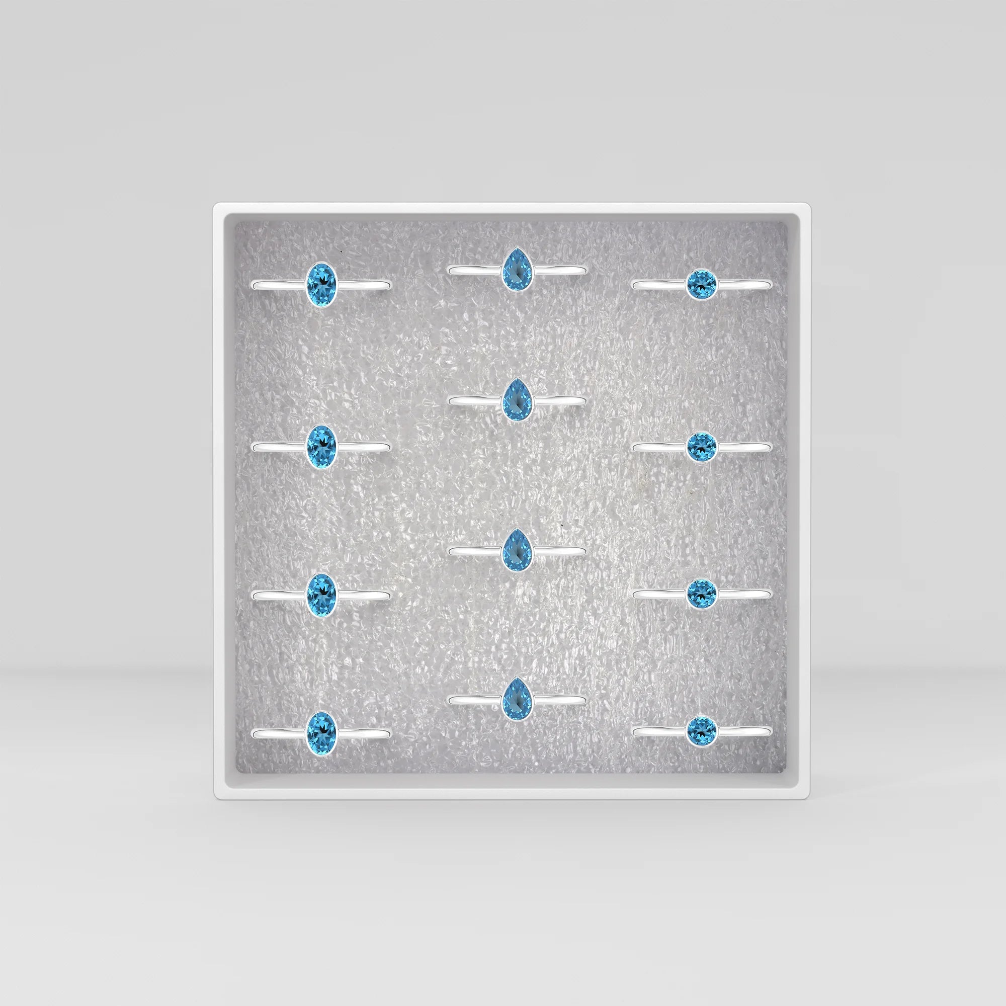 swiss blue topaz stackable bezel-set ring