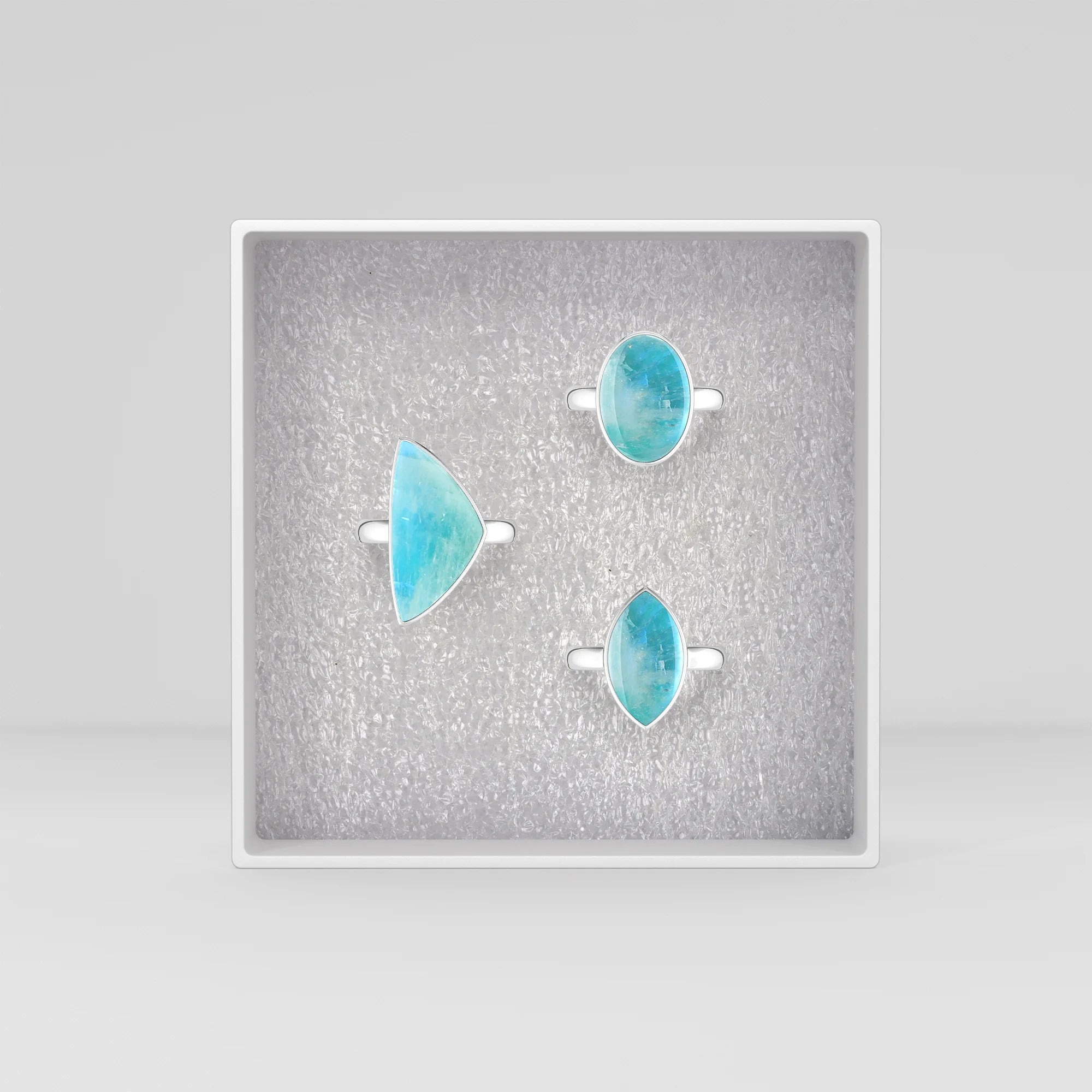 green-moonstone bezel-set ring