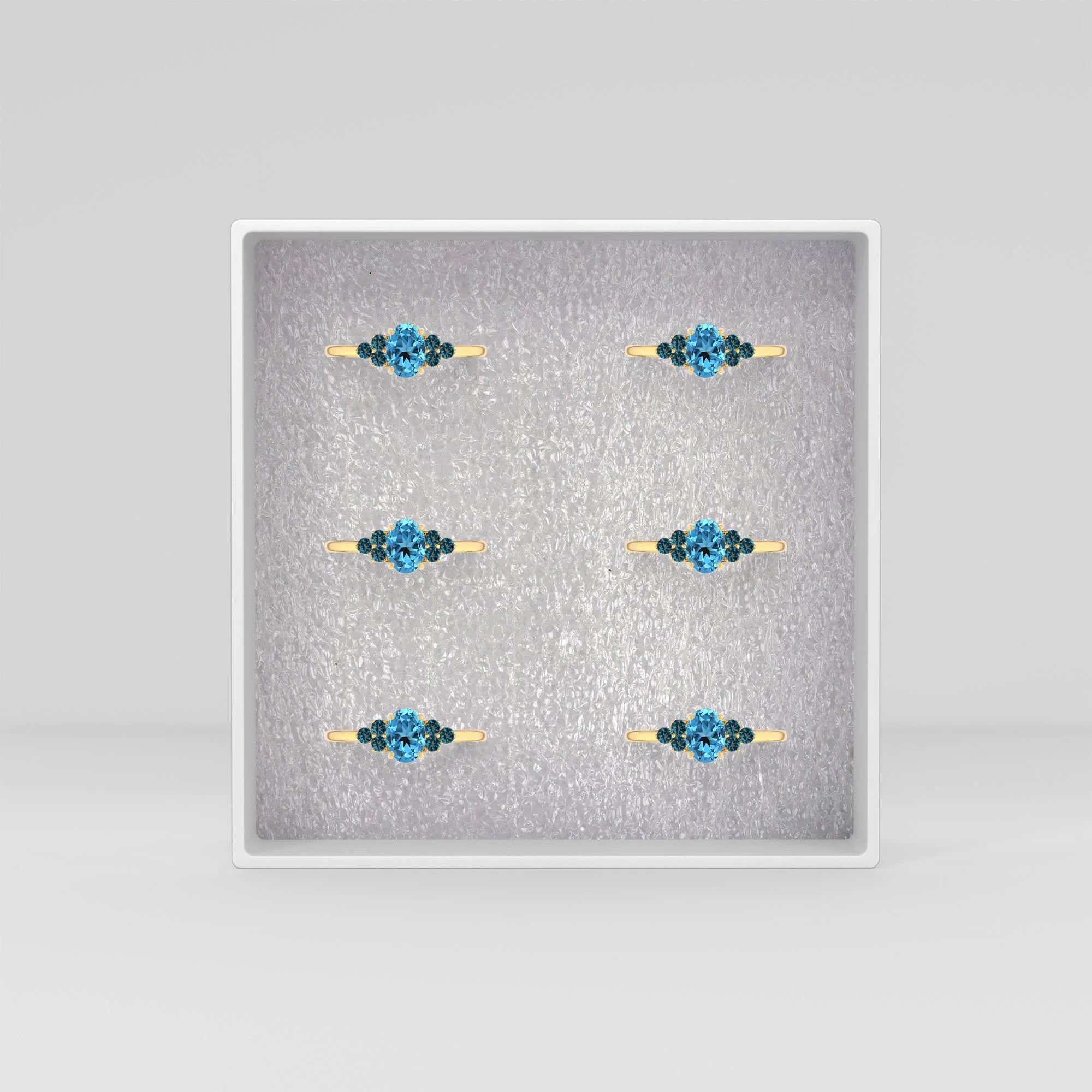 swiss-blue-topaz prong-set ring