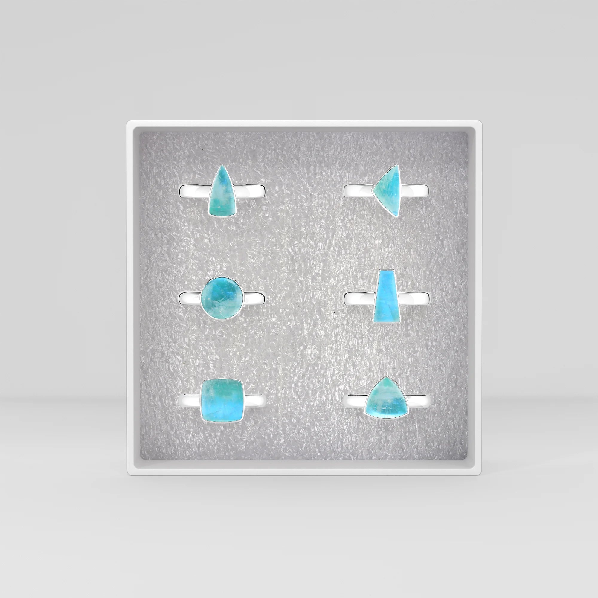 green-moonstone bezel-set ring