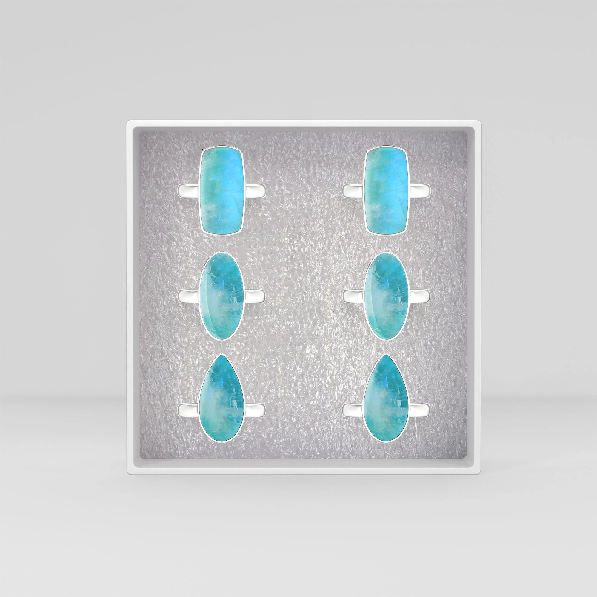 green-moonstone bezel-set ring