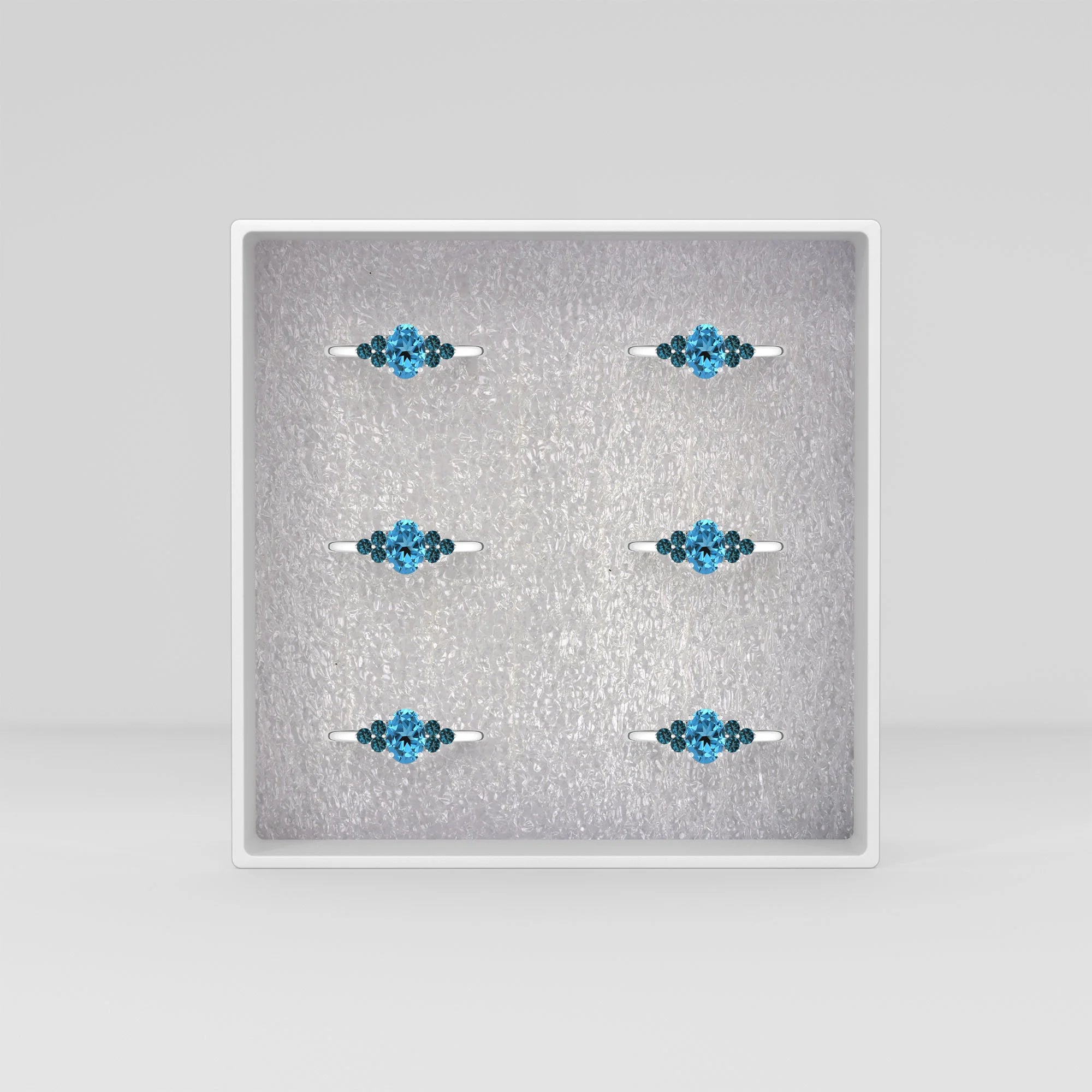 swiss-blue-topaz prong-set ring